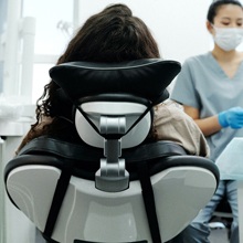 Woman at dentist for dental implants in Houston