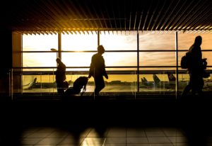 People walking through an airport